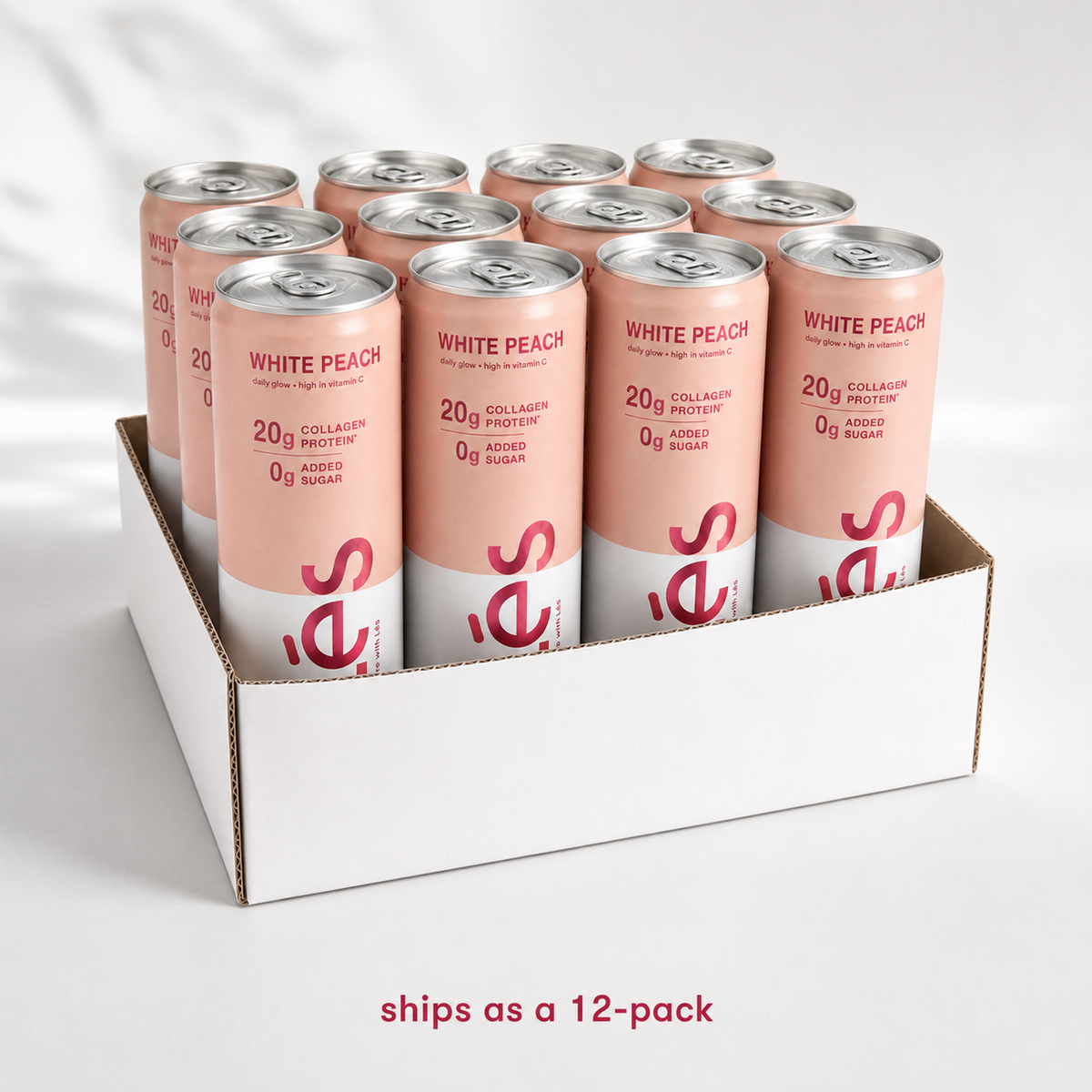 LÉS White Peach sparkling collagen protein drink, single 12 fl oz can shown front-on.